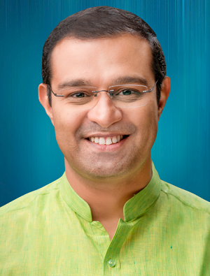 Shri Roji M. John